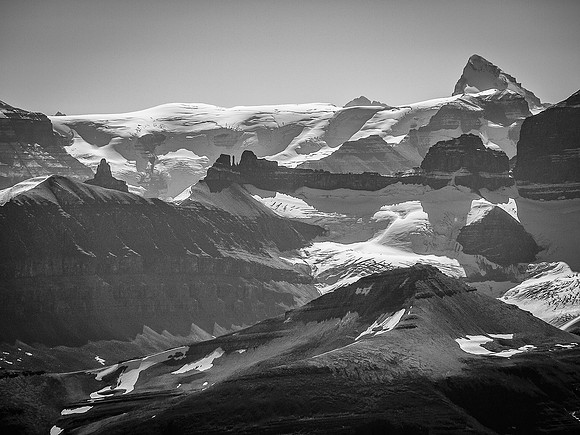 An incredible view of the highest peak in Banff National Park - Mount Forbes, with the Monchy Icefield running in front of it and Hooge Peak on the right