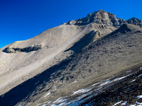 At the col, looking ahead to the traverse left before ascending along the left hand skyline ridge to the summit above.