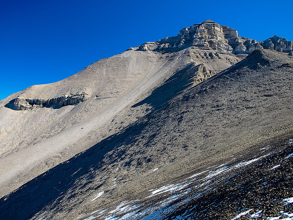 At the col, looking ahead to the traverse left before ascending along the left hand skyline ridge to the summit above.