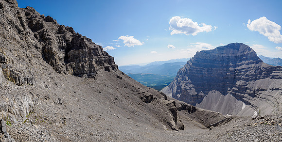 Traversing rubble slopes to the east summit of Battleship Peak.