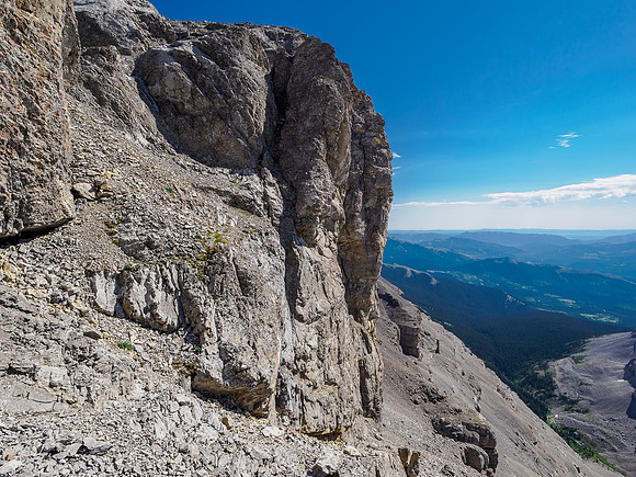 Summit at left, gained via rubble, a crack and then a  down climb to a moderate face.