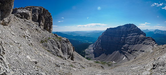 Summit at left, gained via rubble, a crack and then a  down climb to a moderate face.
