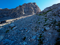 Scrambling loose rubble slopes to the NW2 col.