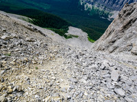 Descending rubble slopes to the boulder field.