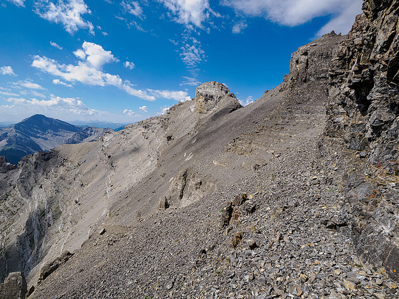 Traversing back under the NE ridge on its south side.