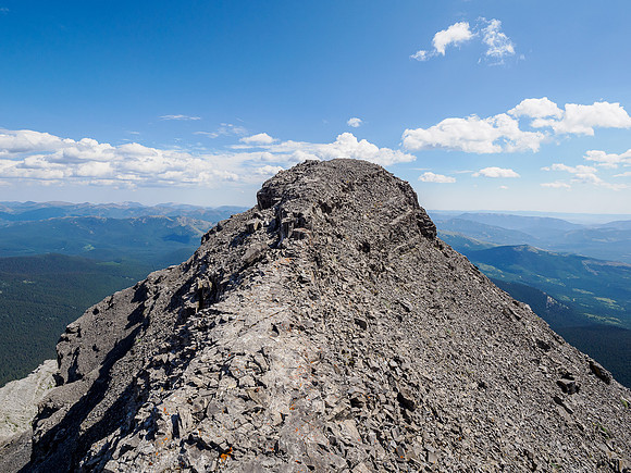 Traversing to the lower east summit.