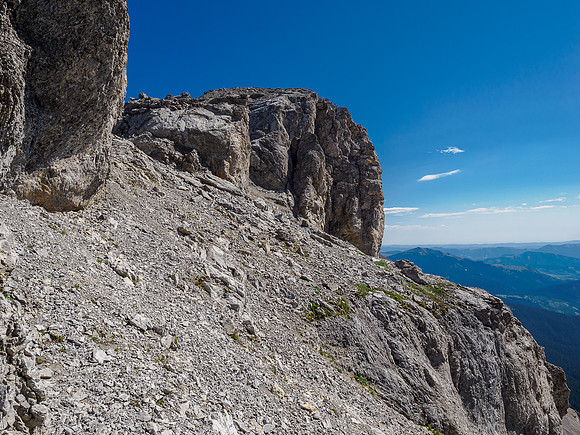 Summit at left, gained via rubble, a crack and then a  down climb to a moderate face.