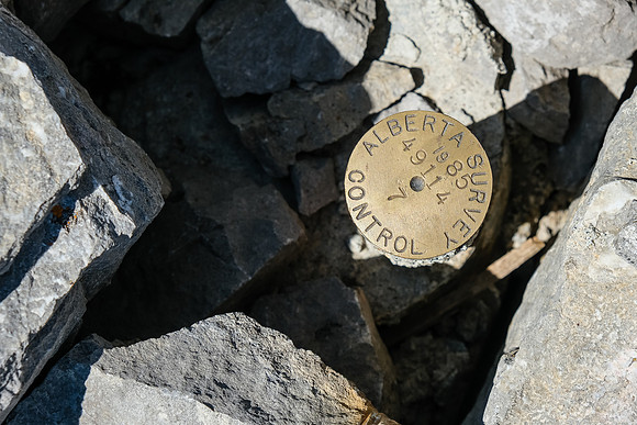 Survey marker at the summit.