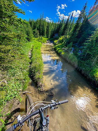 This f'ing puddle was knee deep. Ask me how I know...
