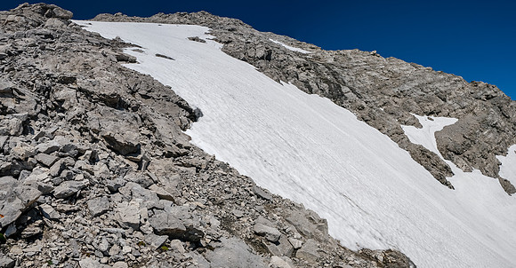 Traversing the face over a large snow patch that I wasn't equipped for.