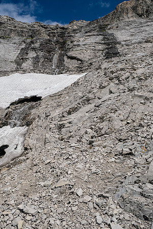 Ascending the lower rubbly SW gully / face of Tornado Mountain.