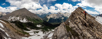 Phil scrambles along the summit ridge of Cross Ridge with Mount Currie rising to the left.