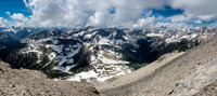 Descending the west face of Currie with Cross Ridge obvious in front of Red Man Mountain. Mount Byng at distant right.