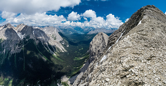 Looking back up the NW ridge of Currie to its summit and down the deep Currie Creek Valley at left to the distant Spray Lakes.