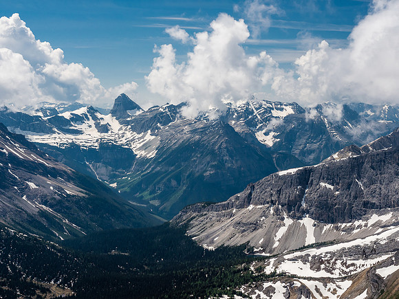 Looking over White Man Pass towards Talon Peak with Soderholm to the right in clouds. Cross Lake just barely visible at lower right.