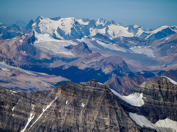 Looking over Isolated and McArthur at Mount Mummery and the Mummery Icefield