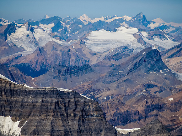Mount Niles in the foreground with Yoho, Collie, Des Poilus, Bryce, Columbia, The Lyells, Forbes and many more peaks visible.