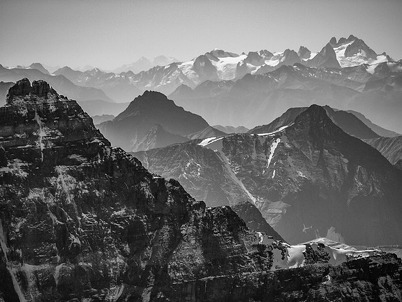 The distinctive view of the very distant Bugaboo mountains.
