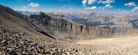 Descending west rubble slopes back into Chortling Marmots valley.