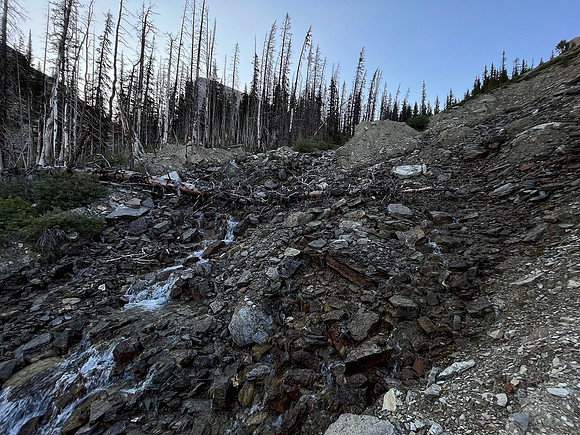 Ascending west slopes into Chortling Marmots Creek valley.