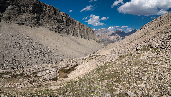 Descending west rubble slopes back into Chortling Marmots valley.