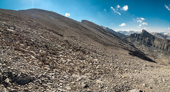 Descending west rubble slopes back into Chortling Marmots valley.
