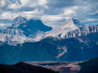 Mount Harrison and Smith Peak are now clearly visible over the mining operation.