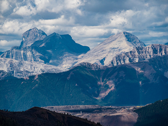 Mount Harrison and Smith Peak are now clearly visible over the mining operation.