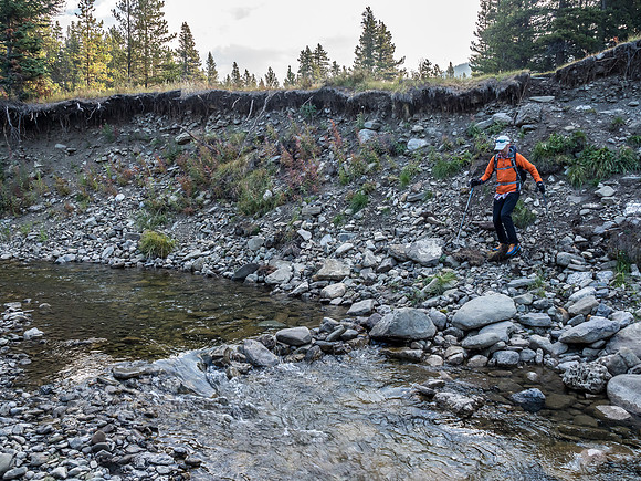 Phil descends to the Oldman River.