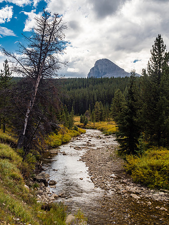 Beehive Mountain looms above a colorful Oldman River Valley as we walk back to the parking spot.