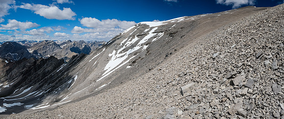 Near the south ridge, looking up to the east summit at right and west summit at center.