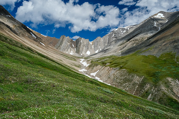 Traversing open meadows to the south bowl of Hangman Peak.