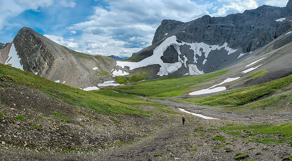 Returning across Littlehorn Meadows to the first pass.