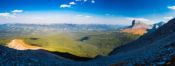More late day lighting looking east over the NE shoulder and towards the Highwood Range including peaks such as Thrift, Thunder, Lightning and others at center and left, with Beehive at right.