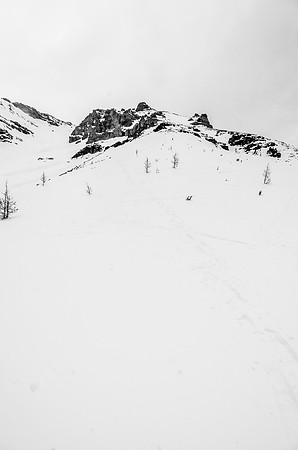 You can barely spot Ben in the flat light - a tiny dot up on the lower ridge. Skiing really sucked here - a punchy crust with no support underneath.