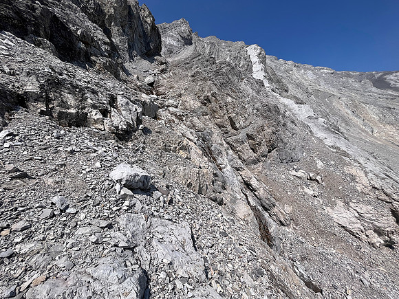 Descending the south face of Puma Peak.