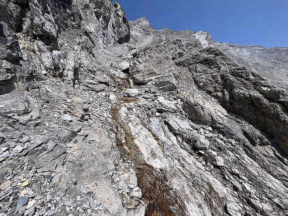 Scrambling the south face of Puma Peak.