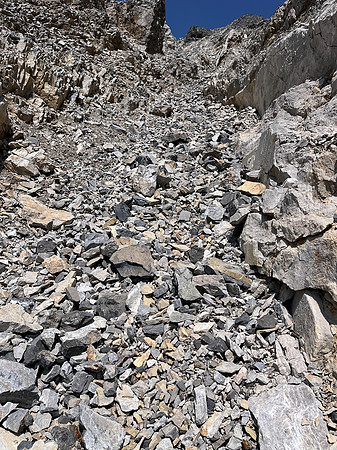 Scrambling the south face of Puma Peak.