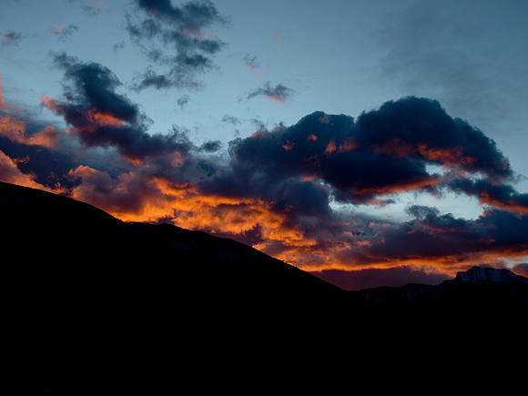 A fiery sunrise along hwy 40. Fisher Peak is just visible on the right hand side of the photo.