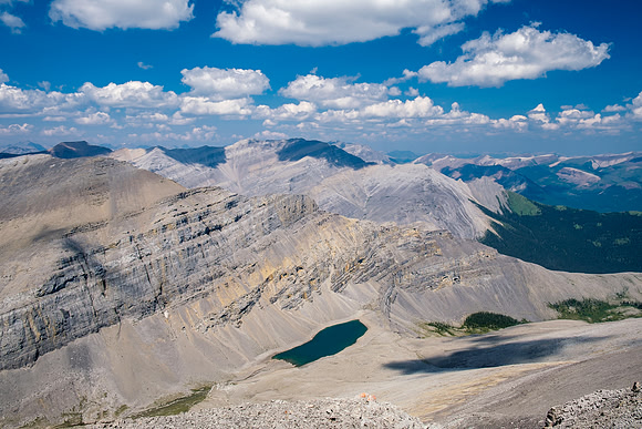Descending the north ridge of HH89 with views over Forbidden Lake.