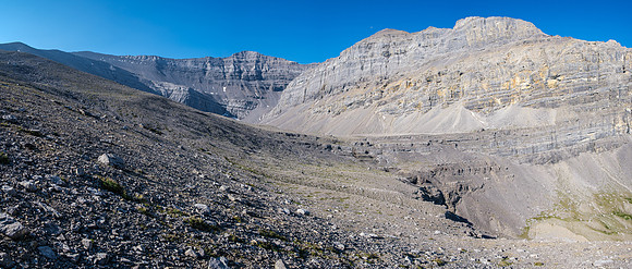 Traversing from the north ridge of HH89 towards Forbidden Lake.