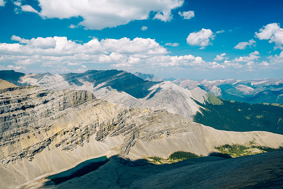 Descending the north ridge of HH89 with views over Forbidden Lake and down Forbidden Creek.