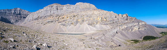 Traversing from the north ridge of HH89 towards Forbidden Lake.