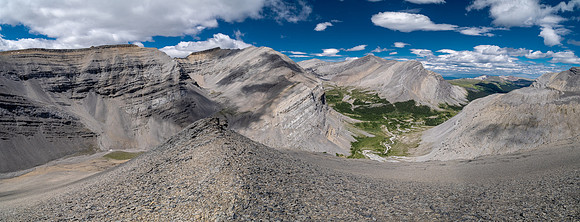 Descending west rubble slopes into the headwaters of Scalp Creek.