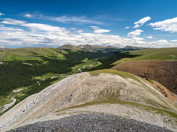 Hiking up an outlier of Elch Peak. Views down Scalp Creek.