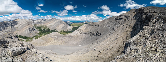 Descending west rubble slopes into the headwaters of Scalp Creek.