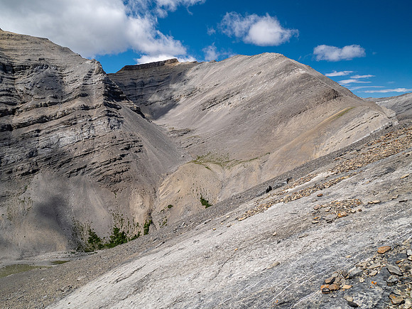 Descending west rubble slopes into the headwaters of Scalp Creek.