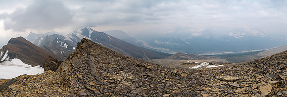 Summit views over a smoke covered Sunwapta River valley with Sunwapta Peak at left.