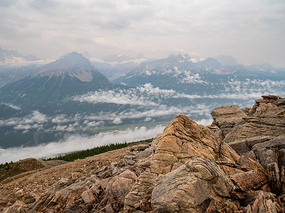 Ascending SW rubble slopes with views back over the Icefields Parkway.
