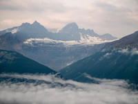 Incredible views over the cloud filled valley to Mushroom and Diadem Peak.
